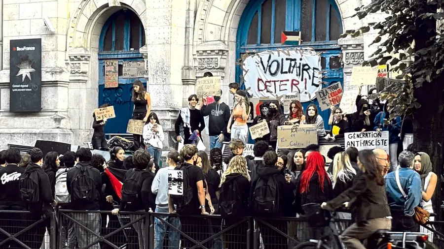 Students take to the streets over the poor condition of schools.