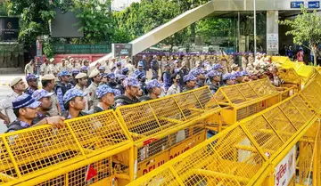 Barricades for democracy... shackles on questions!
