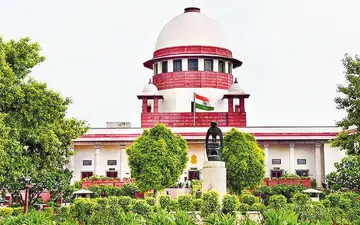 The four-year rule regarding local status is mandatory.