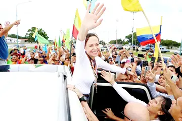Machado returns to Venezuela